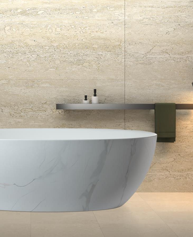 Freestanding bathtub with marble-pattern exterior from the FS Catalogue Brand Story page